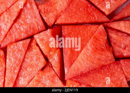 Red watermelon slices texture without seeds top view Stock Photo