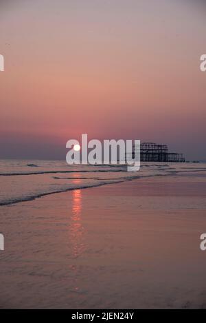 West Pier at Sunset on a Low Tide. Brighton. Stock Photo
