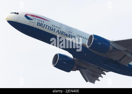 A British Airways Boeing 777 is seen taking off from London Heathrow Airport. Hundreds of the flag carrier’s ground staff have voted to strike next month over a 10% pay cut imposed during the coronavirus pandemic. Stock Photo