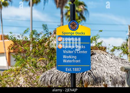 Tarpon Springs, USA - October 4, 2021: Greek town of Tarpon Springs, Florida with sign on road street for sponge docks, downtown, visitor's center, an Stock Photo