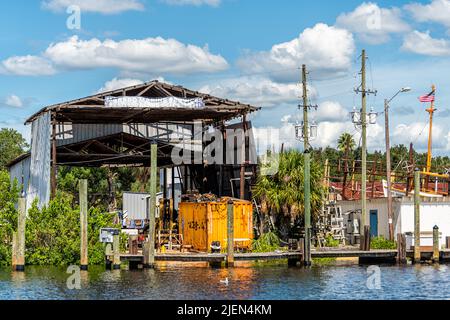 Tarpon Springs, USA - October 4, 2021: Greek town in Florida with fishing industry building boatyard repair for boats in sponge capital of the world o Stock Photo