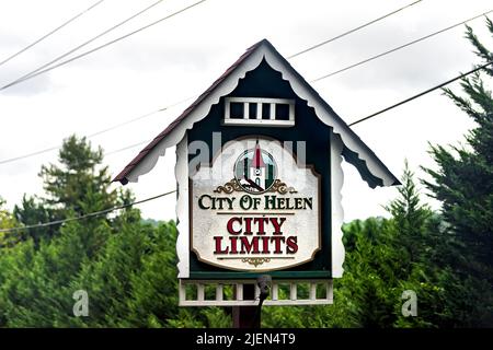 Helen, USA - October 5, 2021: Direction sign on road street for city of Helen, Georgia Bavarian village town in traditional German European architectu Stock Photo