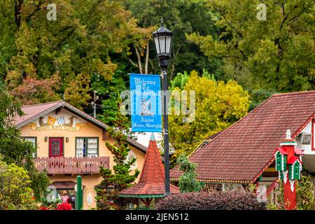 Helen, USA - October 5, 2021: Bavarian village of Helen, Georgia with houses buildings on main street traditional alpine architecture with Oktoberfest Stock Photo