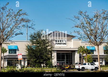 Jacksonville, USA - October 19, 2021: Sign on strip mall building for Baer's furniture brand of designer home furnishings warehouse center store in Fl Stock Photo