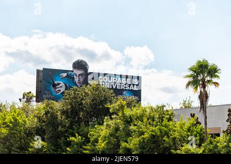 Orlando, USA - October 19, 2021: The Wizarding World of Harry Potter billboard in Florida for Universal Studios themed amusement attraction park with Stock Photo