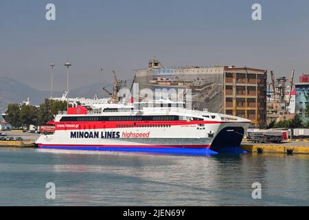 Piraeus, Athens, Greece - June 2022: High speed catamaran ferry Santorini Palace moored in the port Piraeus. The ship is operated by Minoan Lines. Stock Photo