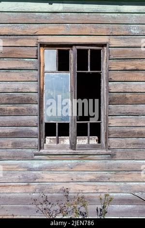 Old broken window abandoned building Stock Photo