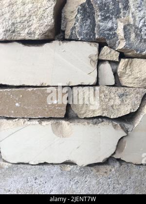 stone cladding on the facade of a house Stock Photo