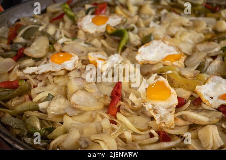 Typical food from Spain. High-calorie fried food called poor potato. Stock Photo