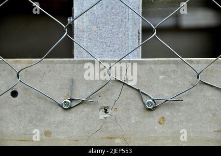 Home yard fence security wire Stock Photo