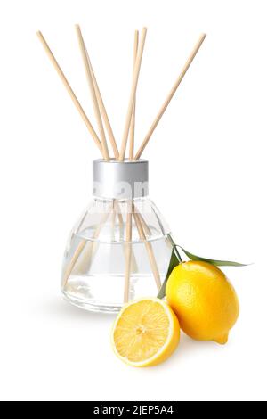 Reed diffuser and lemons on white background Stock Photo