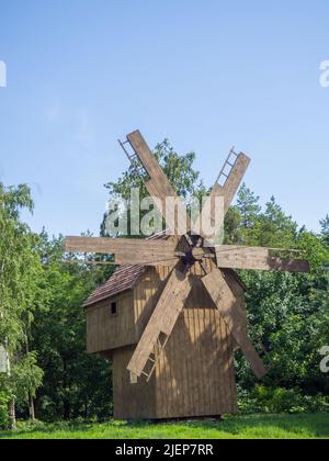 wooden windmill in summer Stock Photo
