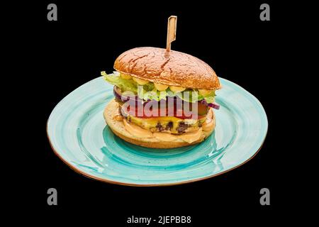 american cheeseburger isolated on a black background Stock Photo