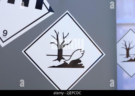 Symbol for corrosive substances on chemical tanks Stock Photo