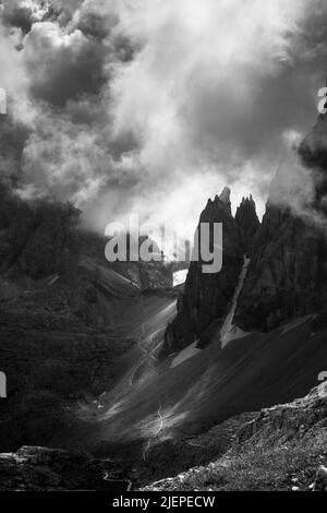 Dramatic clouds sky, atmosphere in the Sexten Dolomites. View on Croda dei Toni (Cima Dodici / Zwölferkofel) Giralba pass. Italian Alps. Europe. Stock Photo