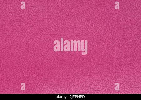 Background image - pink leather texture with textured dressing. Stock Photo