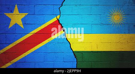 Cracked brick wall painted with a flag of the Democratic Republic of the Congo on the left and a flag of Rwanda on the right. Stock Photo
