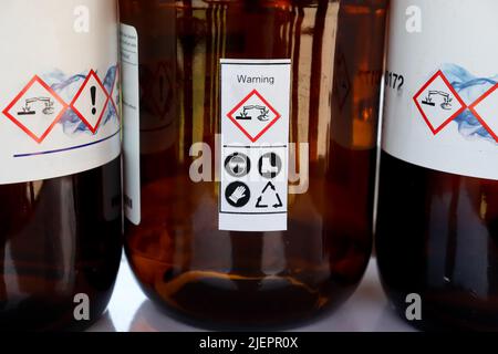 Safety symbol for using chemical, label on chemical bottle Stock Photo