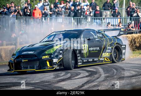 Goodwood, UK. 26th June, 2022. 2017 Nissan GT-R part of the Driftkhana group arriving at the top of the hill after their morning run at the Goodwood Festival Of Speed at the Goodwood Circuit, Goodwood, UK on Sunday 26 June 2022. Photo by Phil Hutchinson. Editorial use only, license required for commercial use. No use in betting, games or a single club/league/player publications. Credit: UK Sports Pics Ltd/Alamy Live News Stock Photo