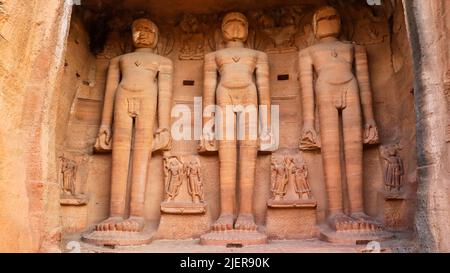 Rock-cut gigantic Jain sculptures at Sidhhachal Caves, built over time starting in the 7th-century, Gwalior Fort, Madhya Pradesh, India. Urvai Group Stock Photo