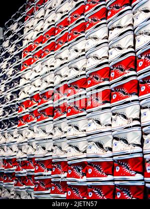 Converse All-Star Chuck Taylor Shoes in red white and blue put together to form a US flag Stock Photo