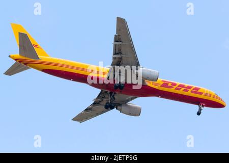 DHL (European Air Transport - EAT) Boeing 757-236(SF) (REG: D-ALEF) on finals runway 31. Stock Photo