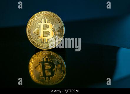 Bitcoin coin or cryptocurrency on dark background, concept financial picture Stock Photo