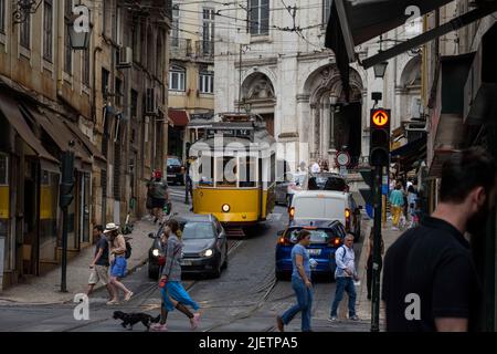 Lisbon, Portugal. 24th June, 2022. A tram rides through the streets of the Baixa district in Lisbon. (Photo by Jorge Castellanos/SOPA Images/Sipa USA) Credit: Sipa USA/Alamy Live News Stock Photo