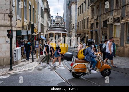 Lisbon, Portugal. 24th June, 2022. A tram rides through the streets of the Baixa district in Lisbon. Credit: SOPA Images Limited/Alamy Live News Stock Photo