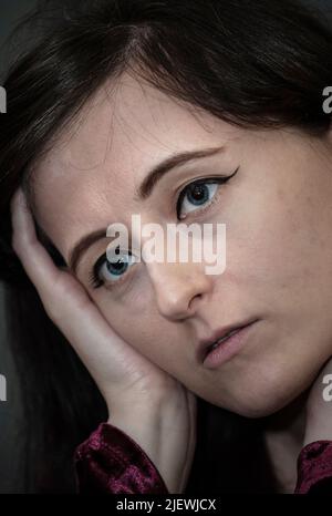 thoughtful young woman Stock Photo