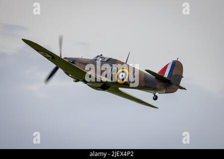 Battle of Britain Hawker Hurricane Mk1 ‘R4118’ airborne at Shuttleworth Evening Airshow on the 18th June 2022 Stock Photo