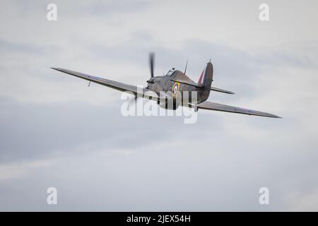 Battle of Britain Hawker Hurricane Mk1 ‘R4118’ airborne at Shuttleworth Evening Airshow on the 18th June 2022 Stock Photo