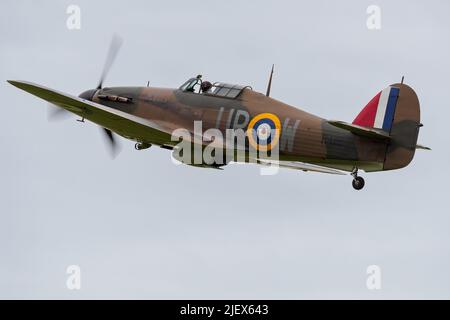 Battle of Britain Hawker Hurricane Mk1 ‘R4118’ airborne at Shuttleworth Evening Airshow on the 18th June 2022 Stock Photo