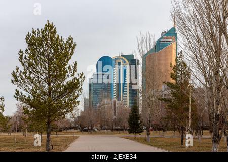 Nur Sultan, Kazakhstan, 11.11.21. Skyline of Nur Sultan (Astana), modern glass skyscrapers office buildings, Buissnes Center, Transport Tauer. Stock Photo
