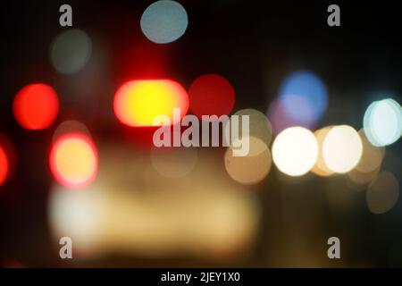 Blur light background on the street at night in balikpapan city East Kalimantan Indonesia, 25 june 2022. Stock Photo