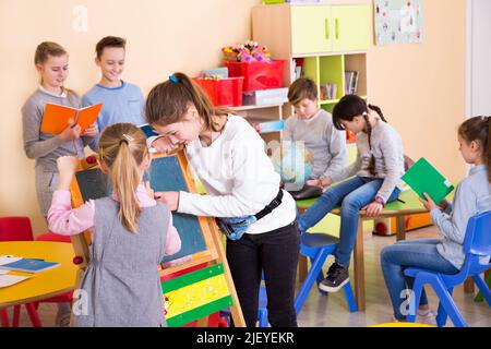 Schoolchildren during break between lessons in elementary school Stock Photo