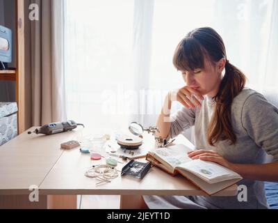 Lifestyle concept, work from home to reinvent your life - Jewelry designer workplace. Woman make jewelry. Georgian minankari enamel manufacturing tech Stock Photo