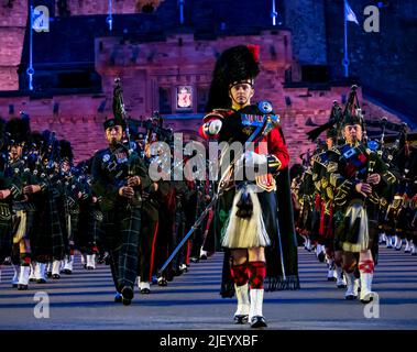 Royal Military Tattoo 2019   with traditional Massed Pipes and Drums marching band playing bagpipes in Scottish military uniform with kilts, Edinburgh Stock Photo