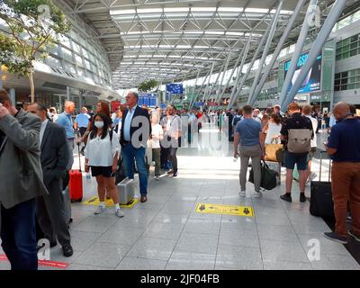 After long queues at check-in and the security check, the Lufthansa subsidiary Eurowings canceled several flights at Duesseldorf Airport. Stock Photo