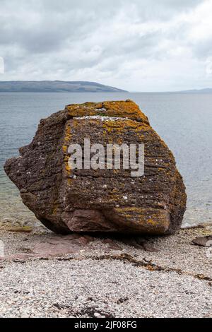 Fallen Rocks a massive boulder along the Arran Coast, Scotland Stock Photo