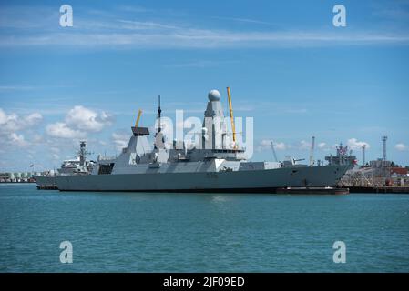 HMS Defender a Type 45 destroyer of the British Royal navy docked in Portsmouth naval base in England. Stock Photo