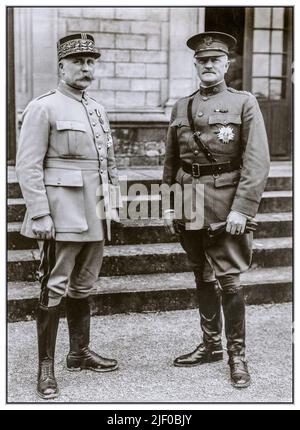 PETAIN & PERSHING WW1 General John J. 'Black Jack' Pershing (1860-1948), who was head of the American Expeditionary Forces in World War I with French general Joseph Petain (1852-1931) in front of the Château du Val des Escholiers, Chaumont, France. Stock Photo