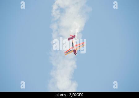 Special acrobatics plane in the sky show. Sukhoi Su-26 Stock Photo