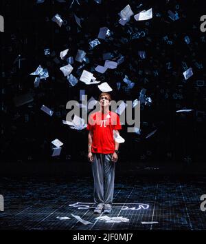 Graham Butler (Christopher Boone) in THE CURIOUS INCIDENT OF THE DOG IN THE NIGHT-TIME by Simon Stephens at the Gielgud Theatre, London W1  08/07/2014  a National Theatre production  adapted from the novel by Mark Haddon  design: Bunny Christie  lighting: Paule Constable  video design: Finn Ross  director: Marianne Elliott Stock Photo