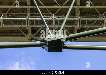 Massive industrial steel construction structure of the bridge Stock Photo