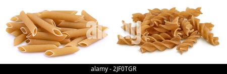 Wholegrain penne and fusilli pasta from durum wheat isolated on white background with clipping path and full depth of field. Stock Photo