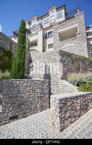 natural stone on the facade of the house glue Stock Photo - Alamy