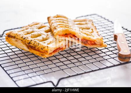 Puff pastry vegetable pie with tomatoes, onions, herbs and eggplant Stock Photo