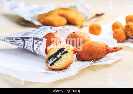 Finger food and street food - fried curd balls filled with Oreo cookies Stock Photo