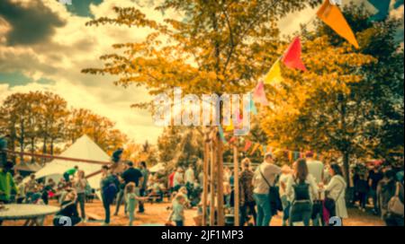 Abstract blur image of  people and food trucks in vintage style.  Blur image of street festival with bokeh for background usage Stock Photo